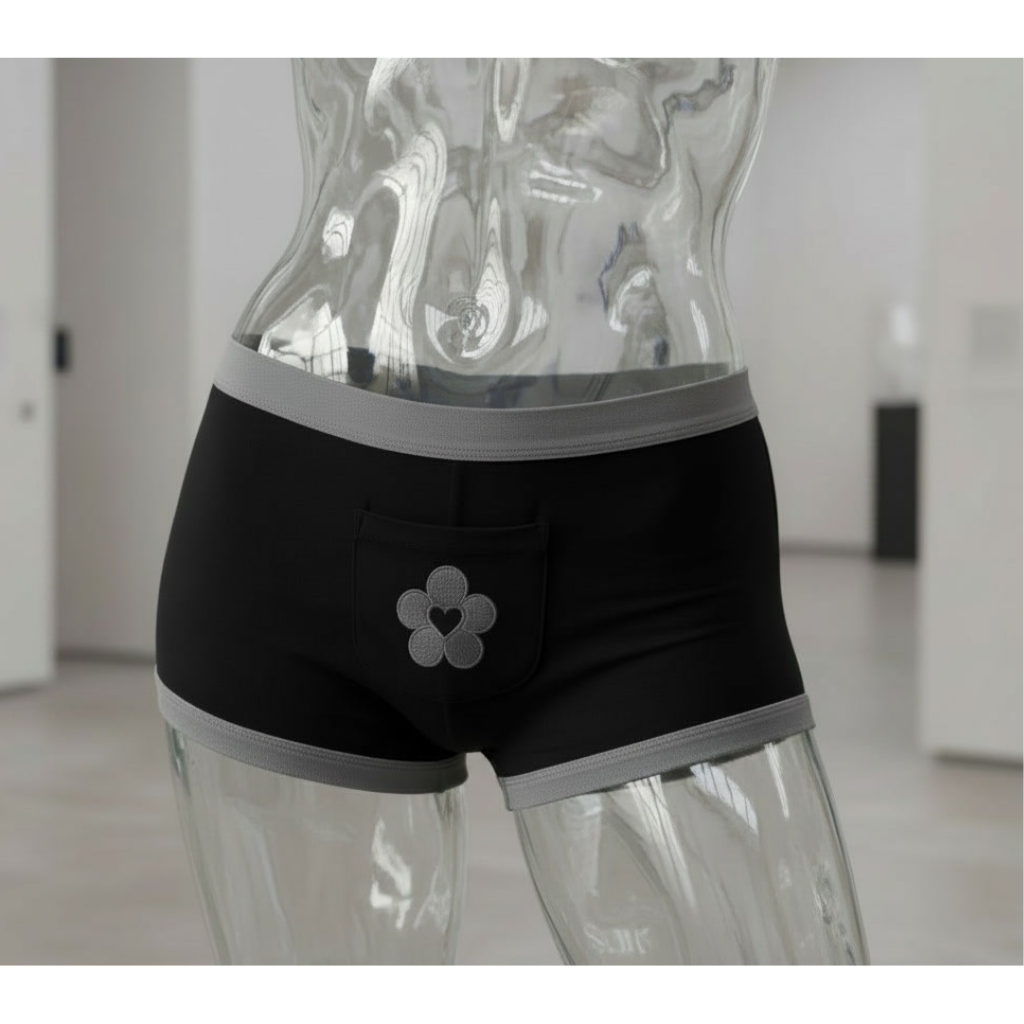 Black women’s boxer-style underwear with gray trim, front pocket, and flower heart embroidery